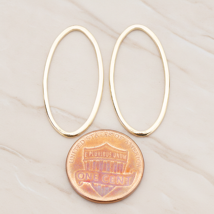 15 X 30 Mm Simple Oval Link Pendant, 2 Pc on warm marble background (PD.304-02)