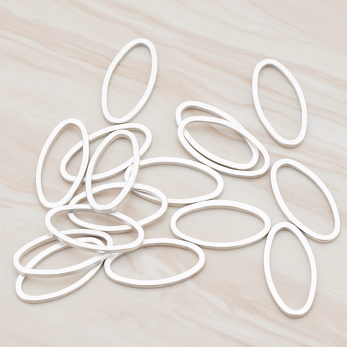 8 X 16 Mm Simple Oval Link Pendant, 4 Pc on warm marble background (PD.304-03)