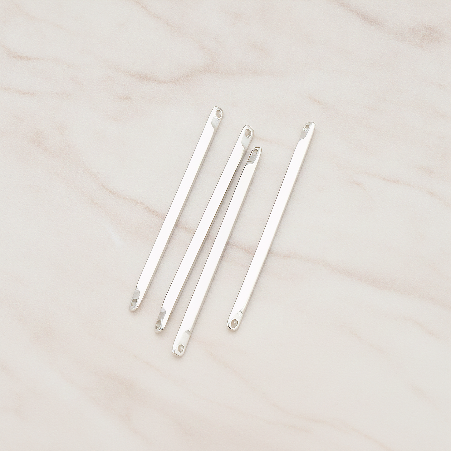 Simple Diamond Shape Double Hole Flat End Bar Connector Pendant, 6 Pc on warm marble background (PD.312)