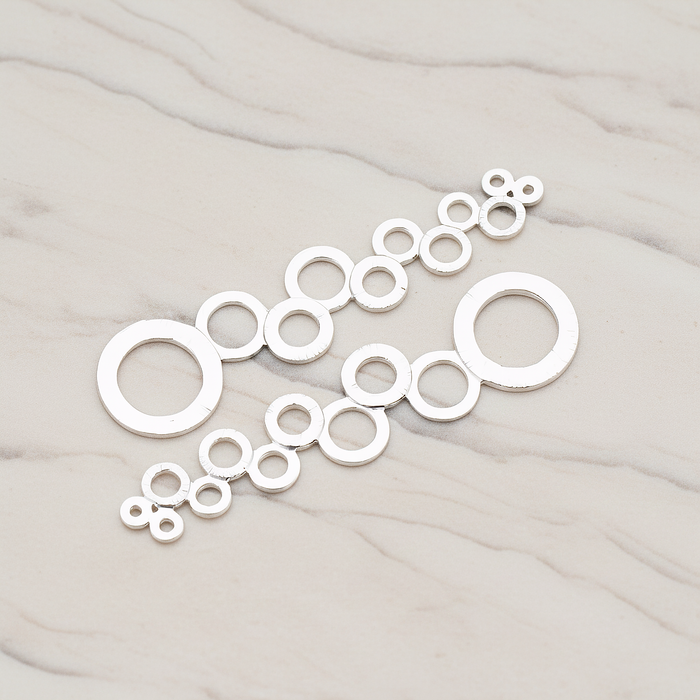 Brushed Multi Circle Stream Pendant, 2 Pc on warm marble background (PD.318-05)