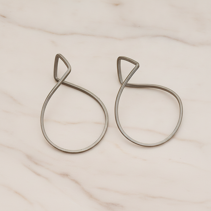 Simple Twisted Teardrop Pendant, 2 Pc on warm marble background (PD.322)