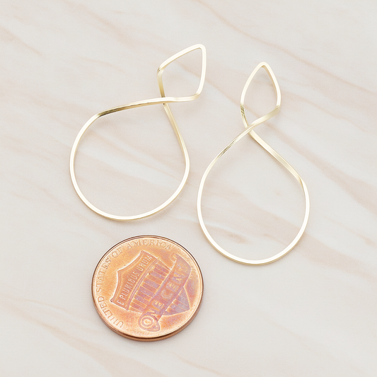 Simple Twisted Teardrop Pendant, 2 Pc on warm marble background (PD.322)