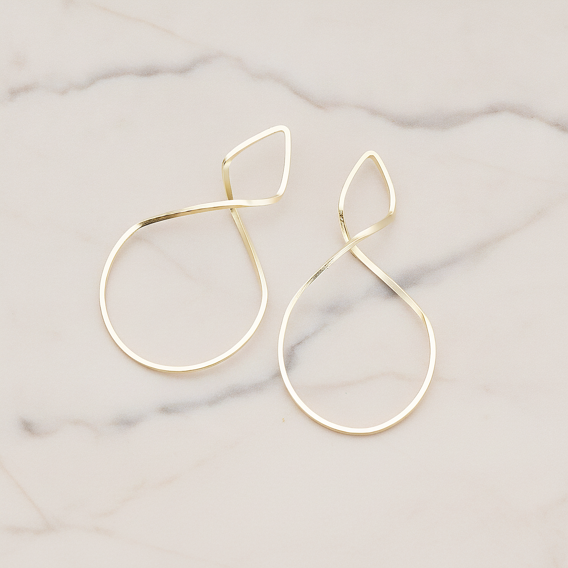 Simple Twisted Teardrop Pendant, 2 Pc on warm marble background (PD.322)