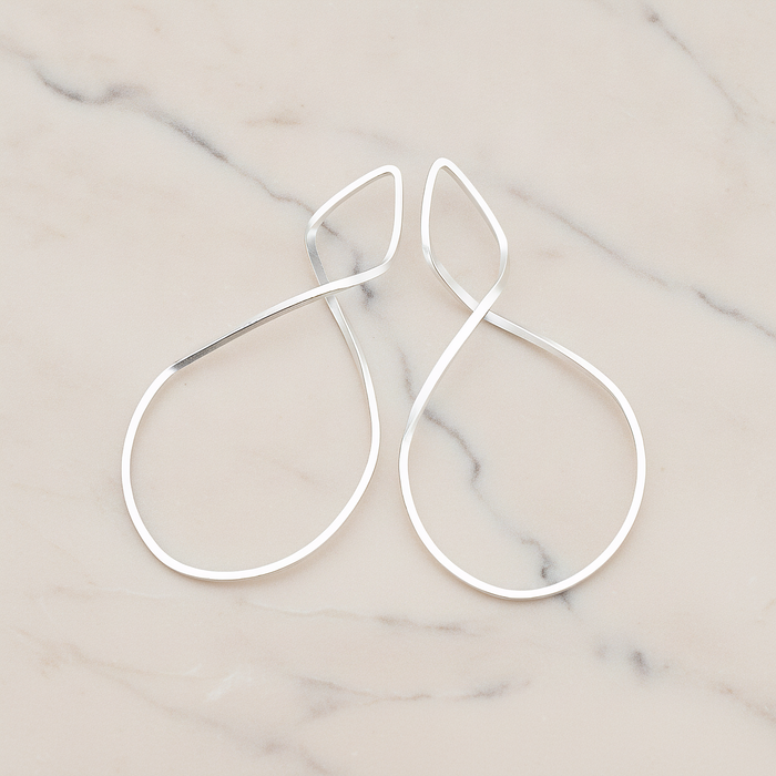 Simple Twisted Teardrop Pendant, 2 Pc on warm marble background (PD.322)