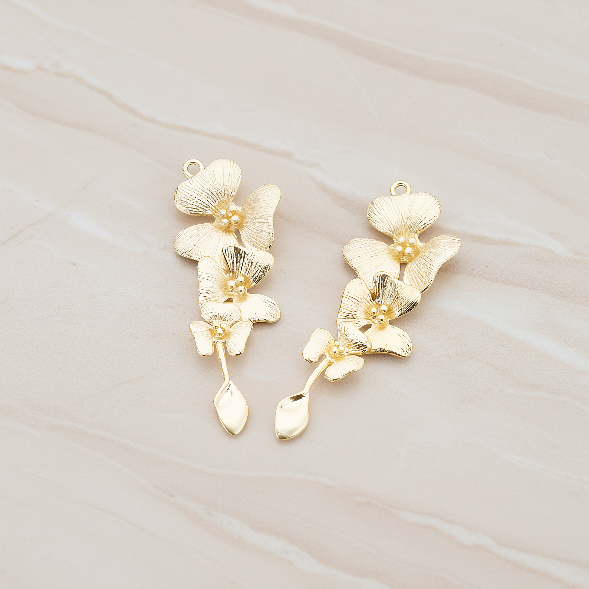 Triple Flower with Tail Pendant, 2 Pc on warm marble background (PD.377)