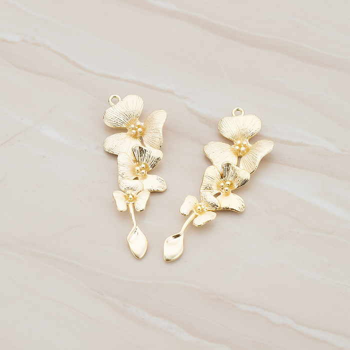Triple Flower with Tail Pendant, 2 Pc on warm marble background (PD.377)