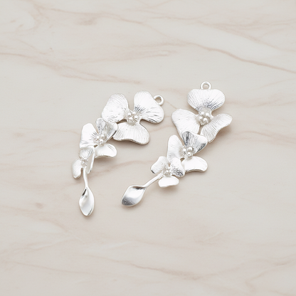 Triple Flower with Tail Pendant, 2 Pc on warm marble background (PD.377)