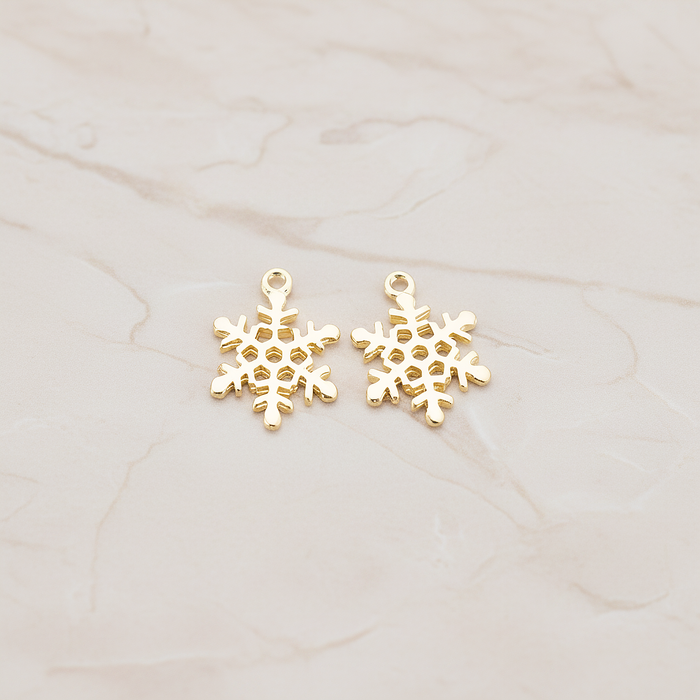 Small Snow Flake Pendant, 2 Pc on warm marble background (PD.379-01)