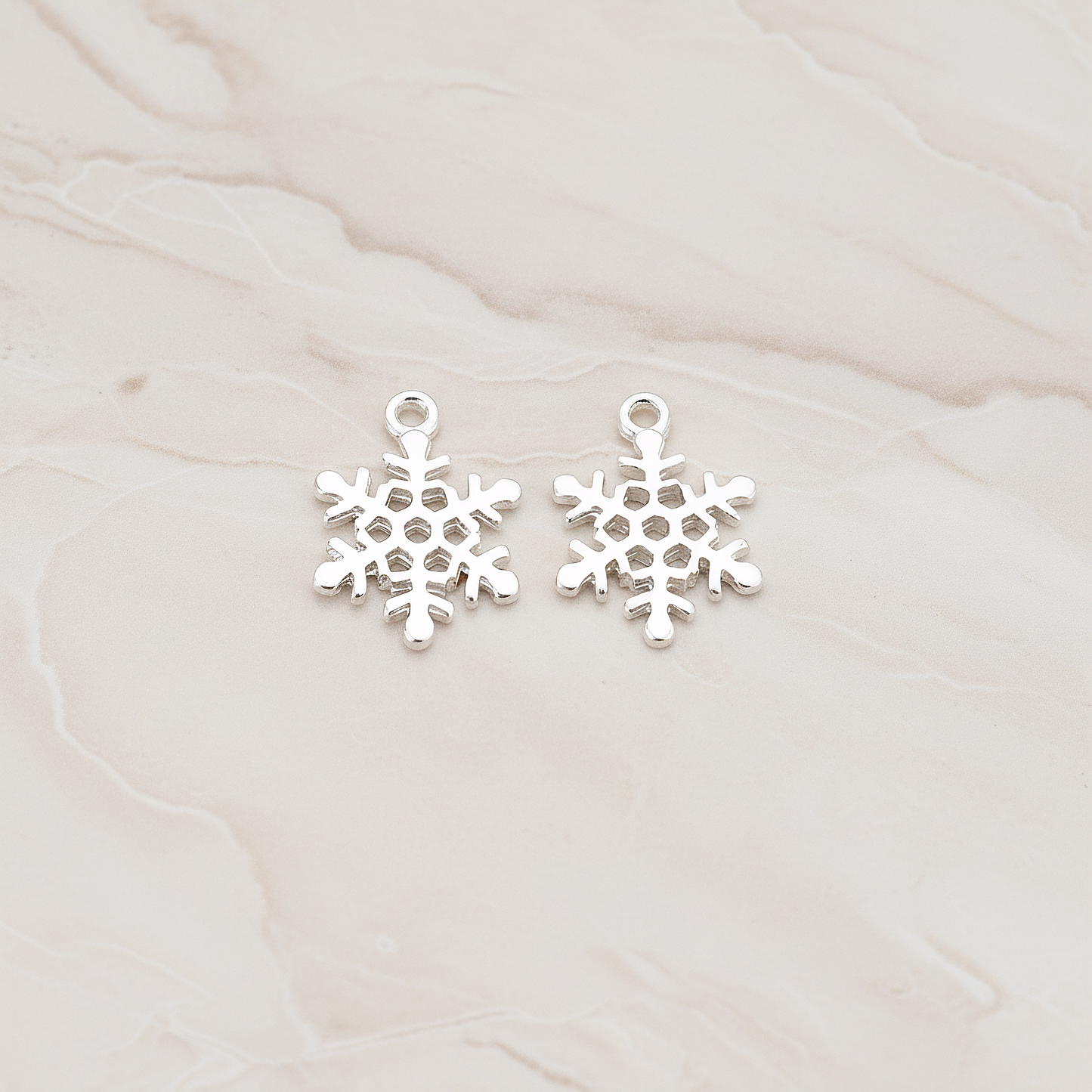 Small Snow Flake Pendant, 2 Pc on warm marble background (PD.379-01)