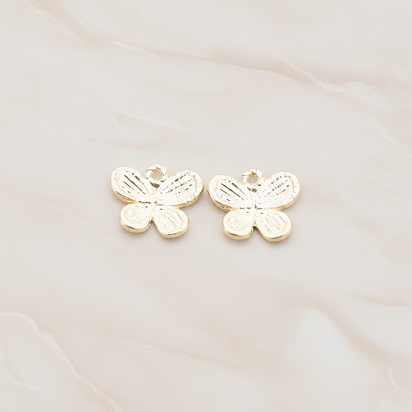 Four Petals Small Butterfly Shaped Pendant, 2 Pc on warm marble background (PD.379-02)