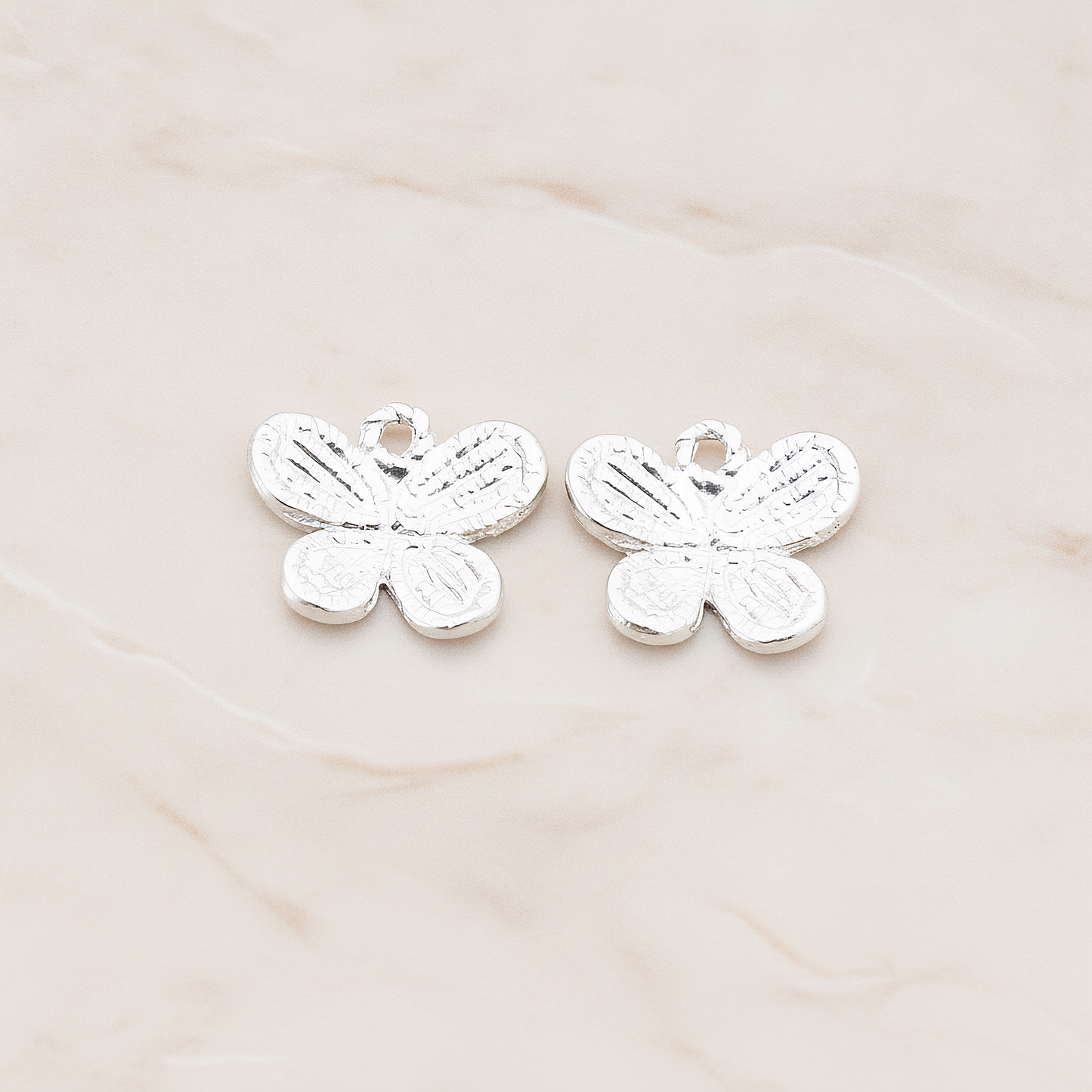 Four Petals Small Butterfly Shaped Pendant, 2 Pc on warm marble background (PD.379-02)
