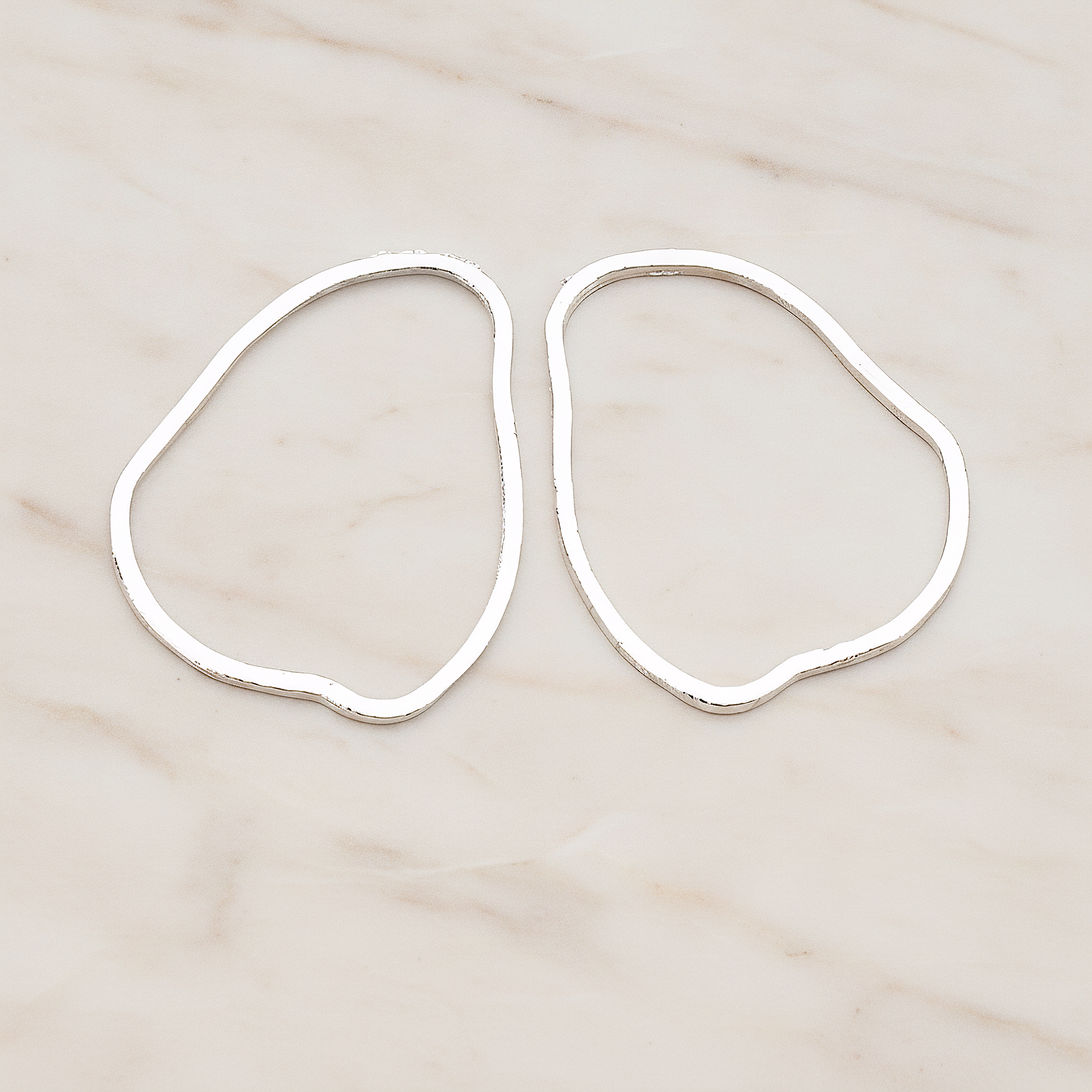 Uneven Circle Link Pendant, 2 Pc on warm marble background (PD.421)