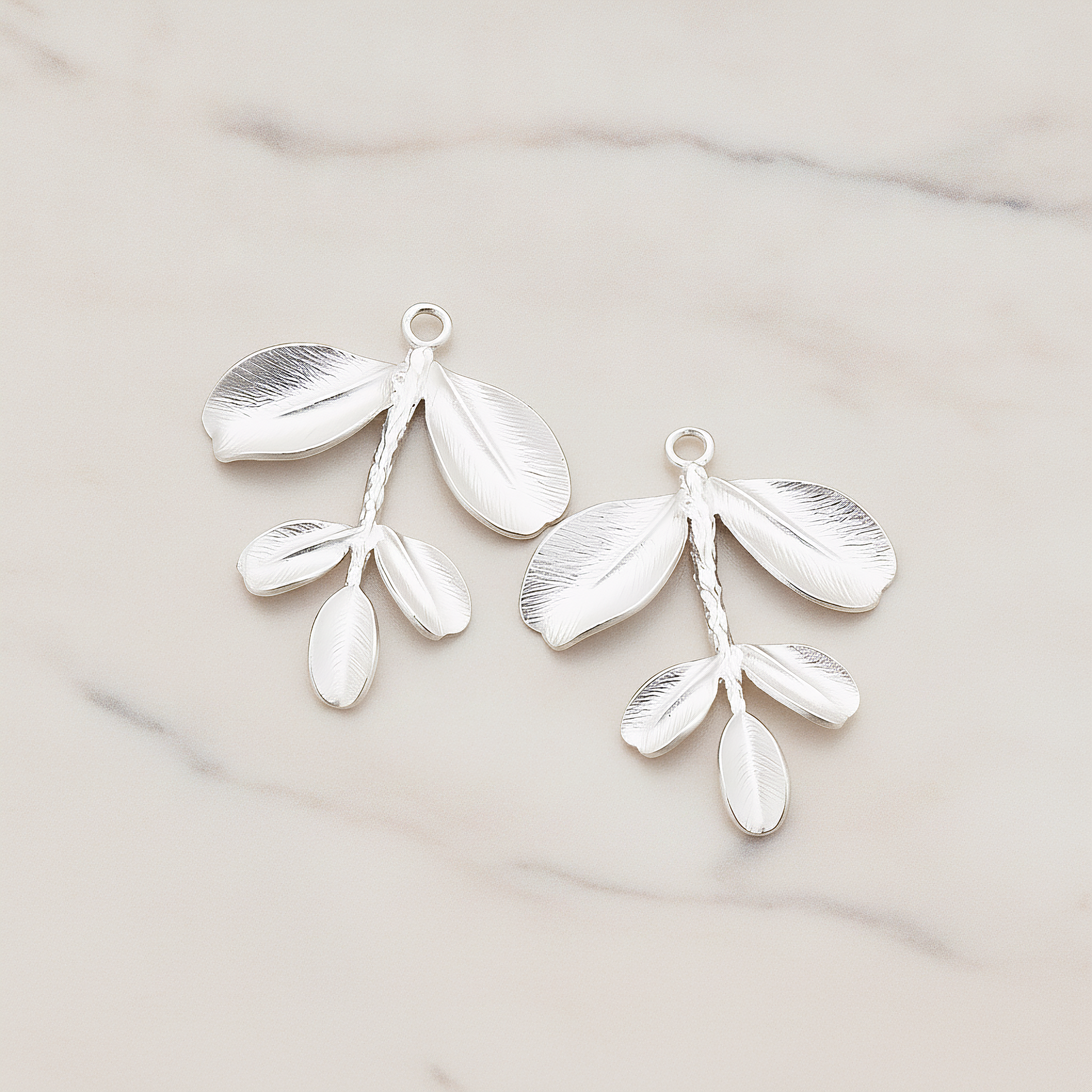 Branch with Five Leaf Pendant, 2 Pc on warm marble background (PD.425)