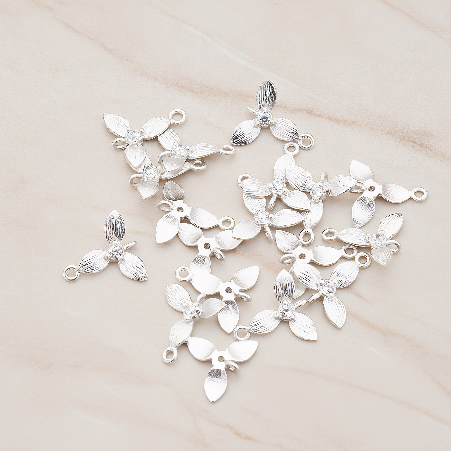 Cubic Zirconia Centered Flower Connector Pendant, 2 Pc on warm marble background (PD.429)