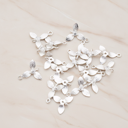 Cubic Zirconia Centered Flower Connector Pendant, 2 Pc on warm marble background (PD.429)
