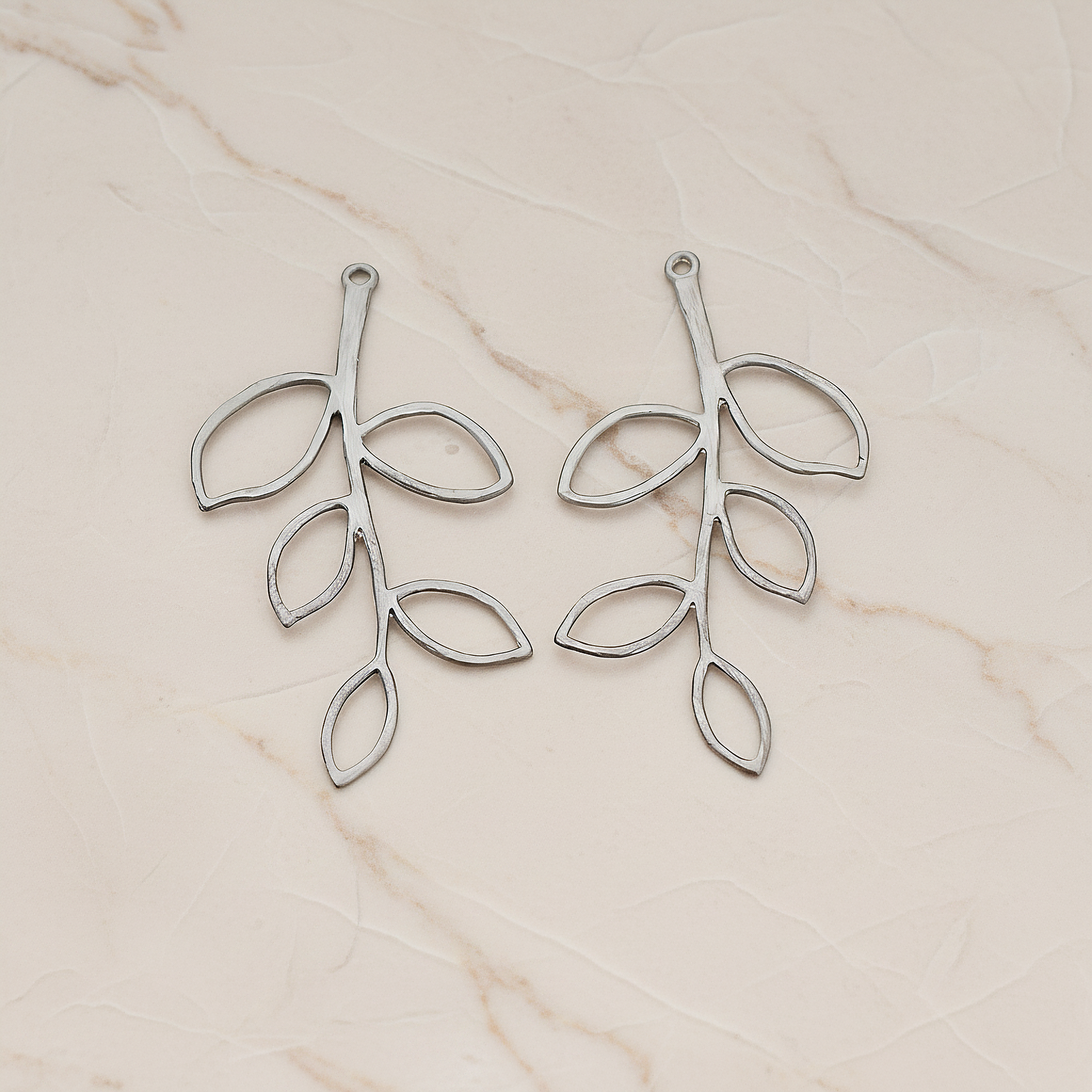 Large Twig Charm Pendant, 2 Pc on warm marble background (PD.505-02)