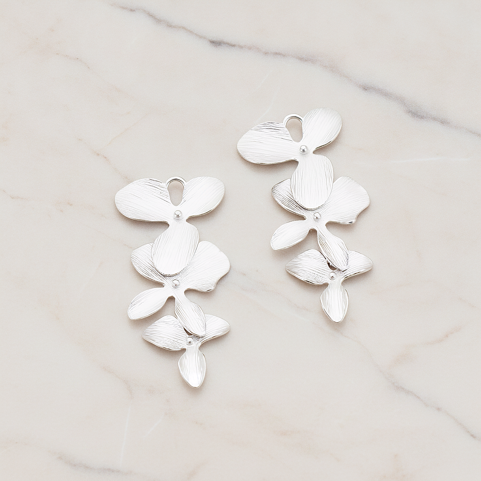 Triple Flower Pendant, 2 Pc on warm marble background (PD.507-01)