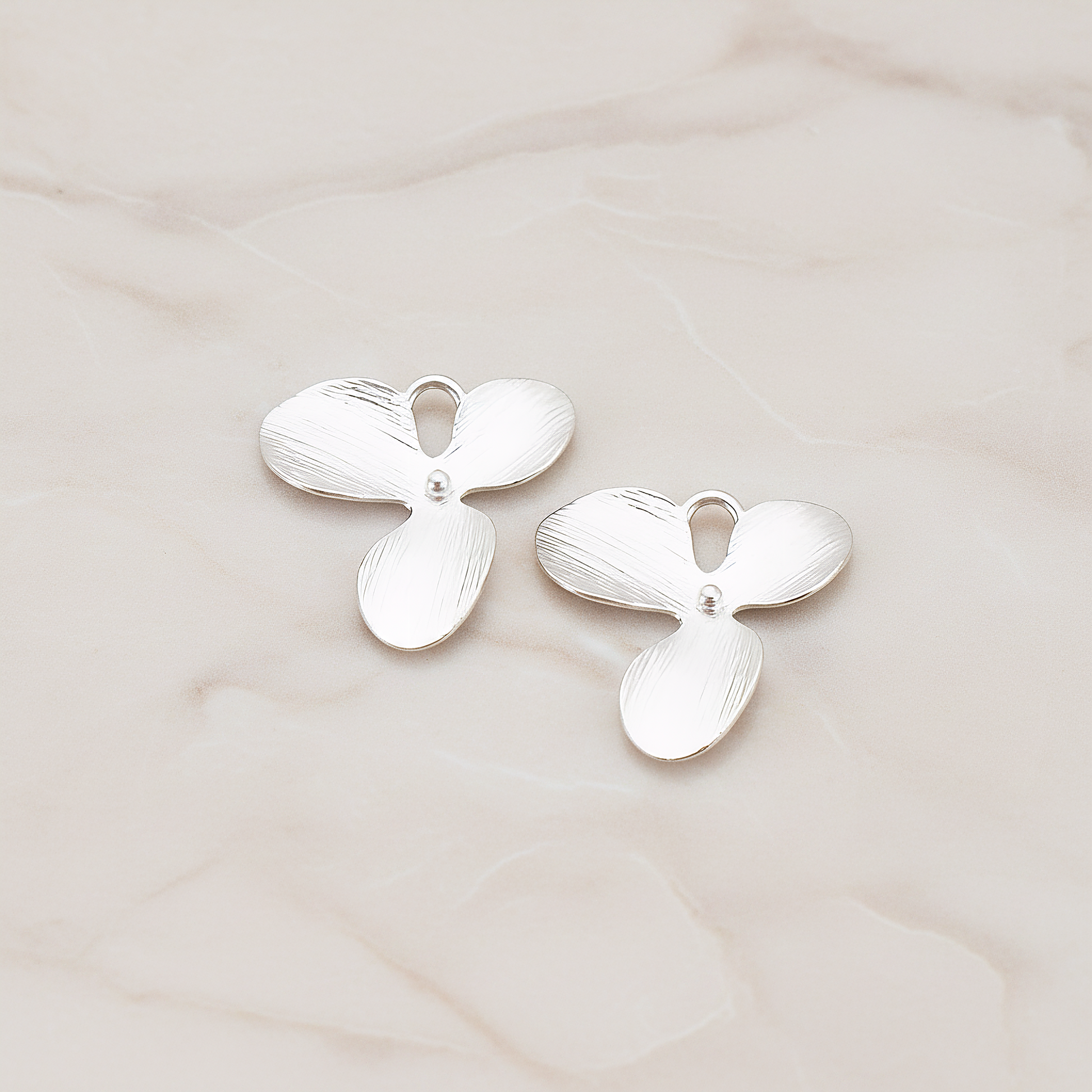 Three Petal Flower Pendant, 2 Pc on warm marble background (PD.507-02)