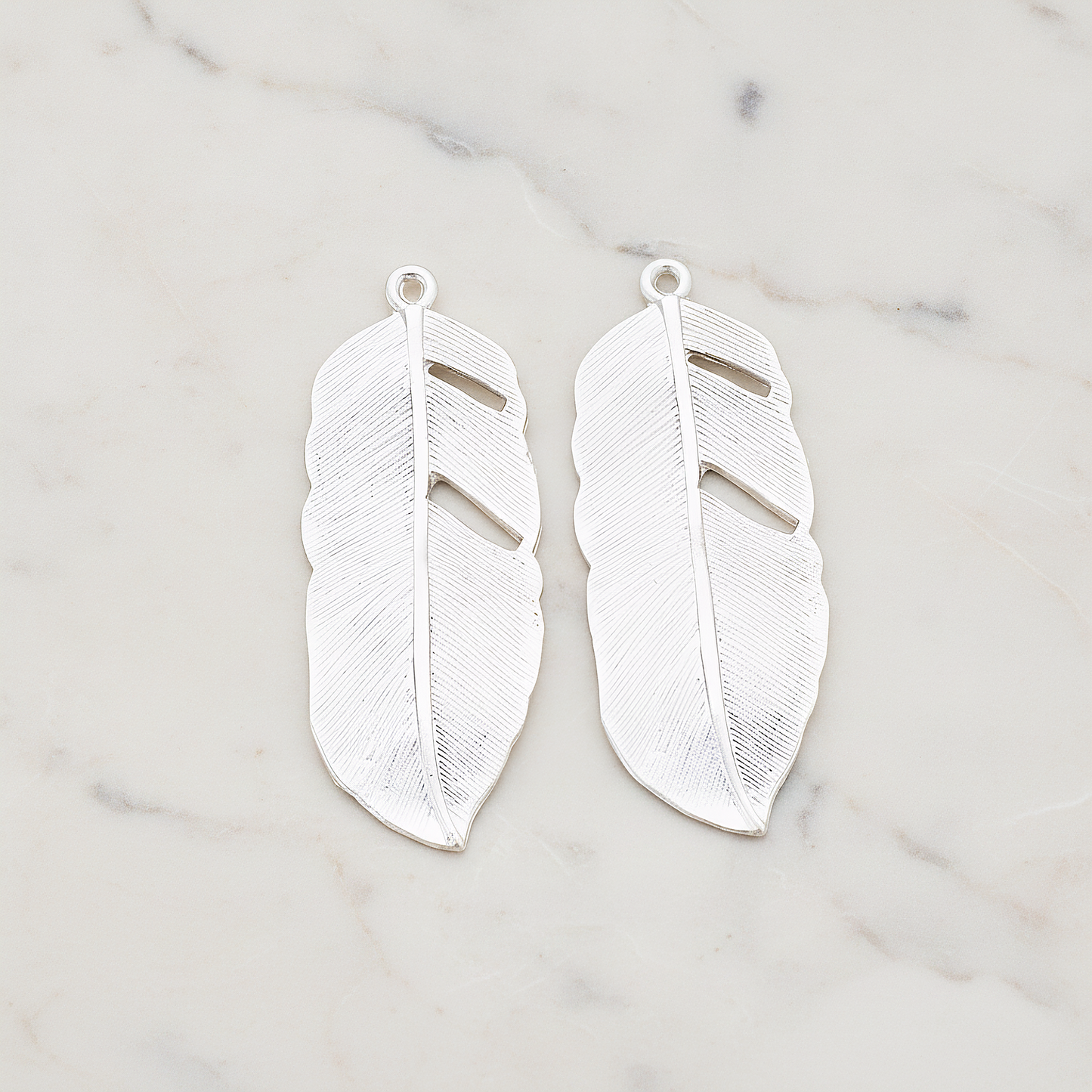 Feather Pendant, 2 Pc on warm marble background (PD.510)