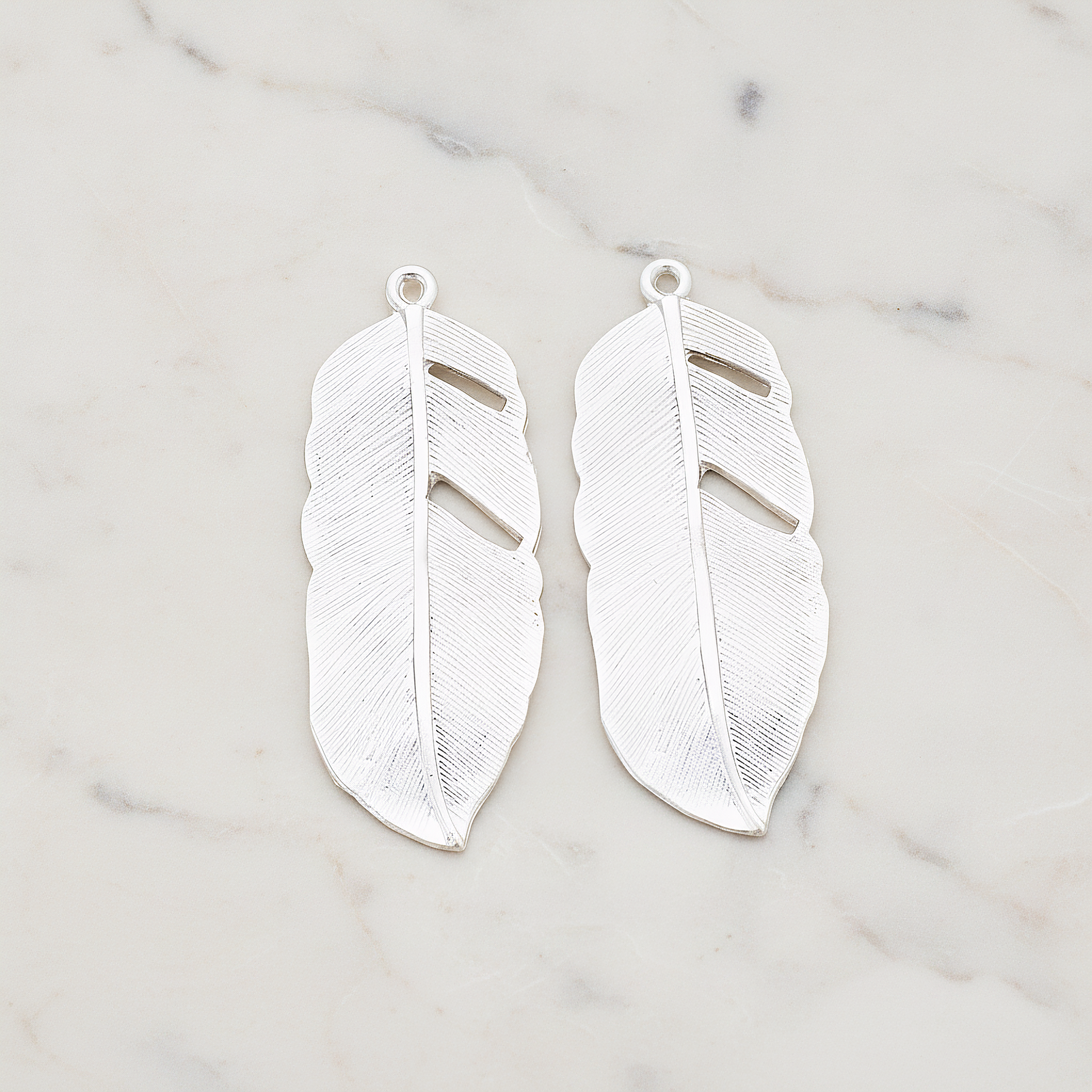 Feather Pendant, 2 Pc on warm marble background (PD.510)