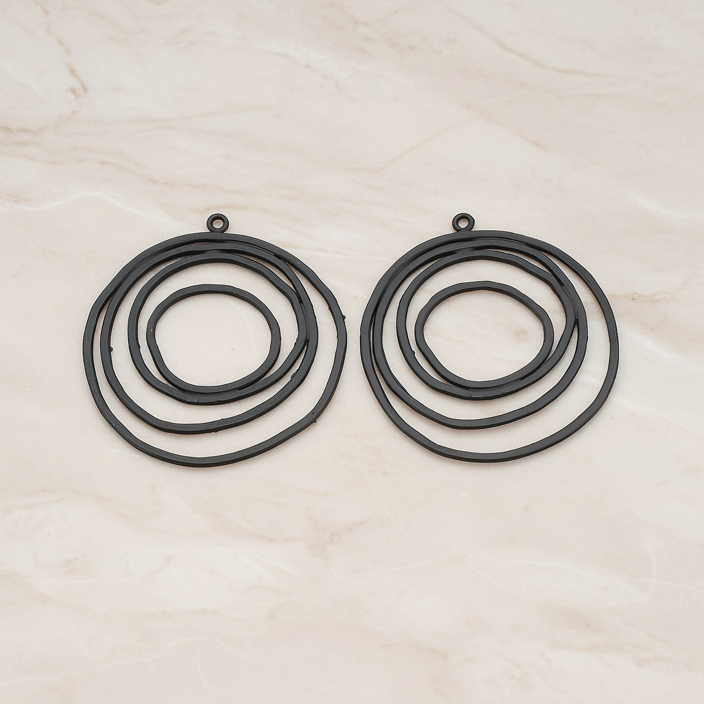 Round Circle Swirl Pendant, 2 Pc on warm marble background (PD.556)