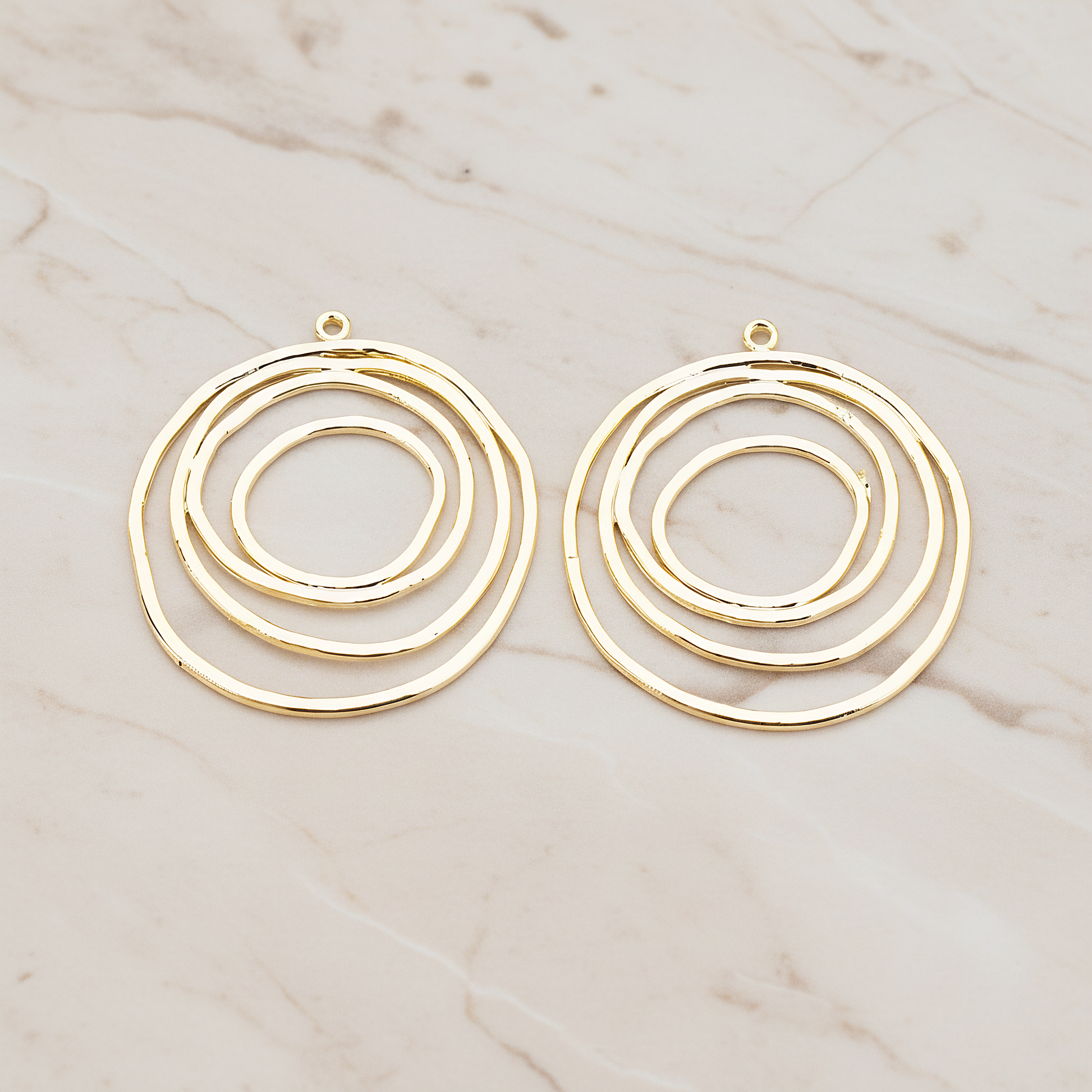 Round Circle Swirl Pendant, 2 Pc on warm marble background (PD.556)