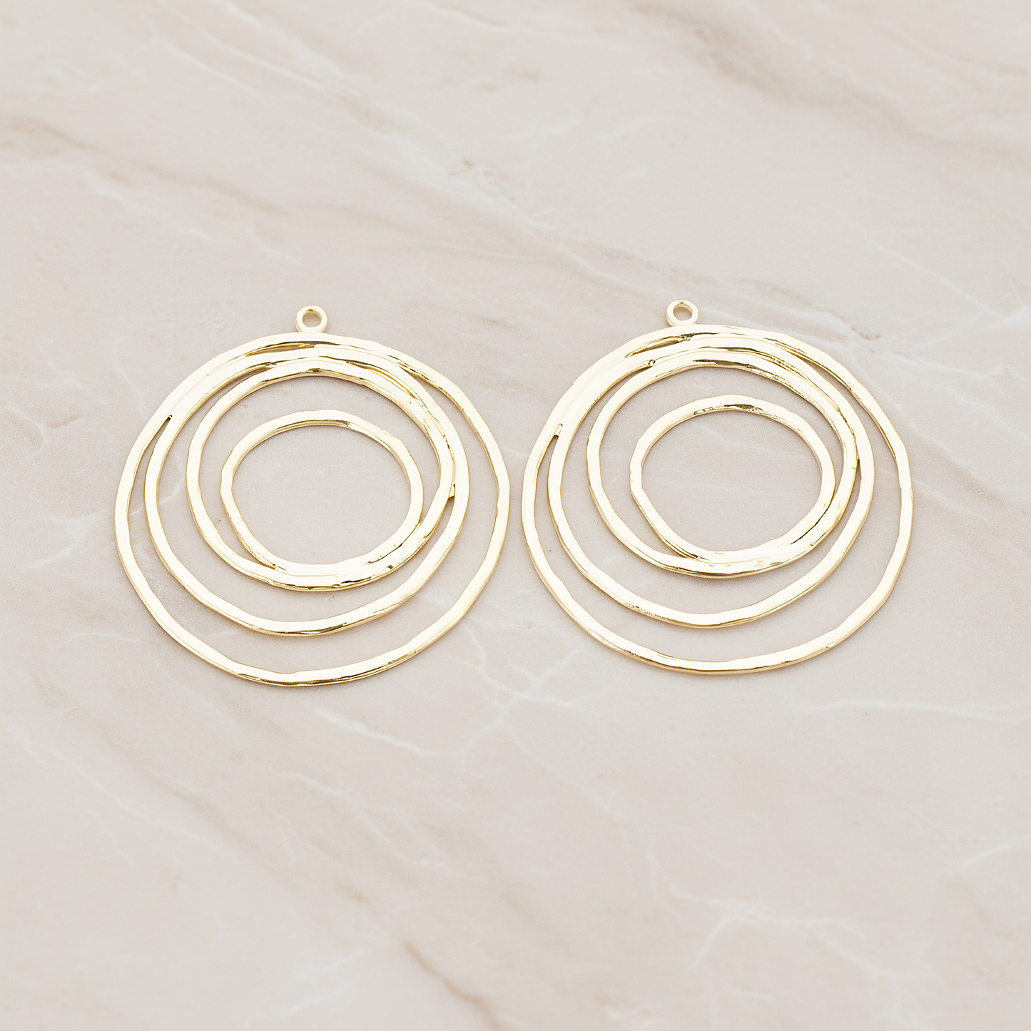 Round Circle Swirl Pendant, 2 Pc on warm marble background (PD.556)