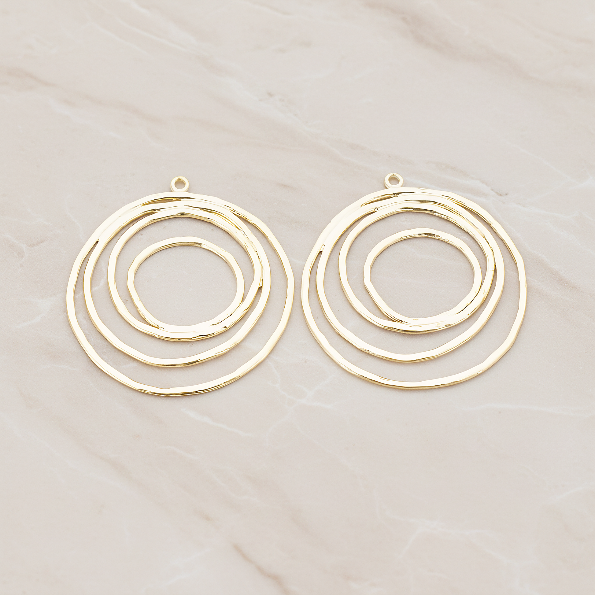Round Circle Swirl Pendant, 2 Pc on warm marble background (PD.556)