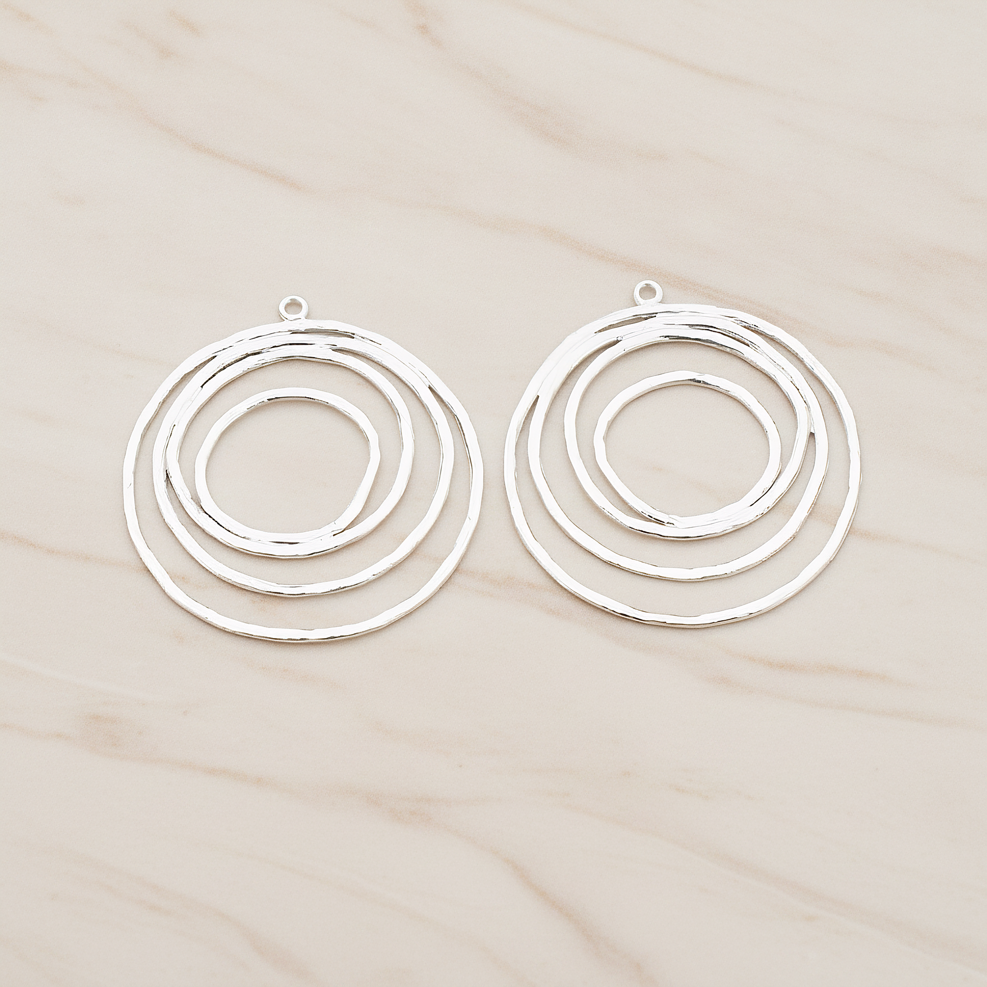 Round Circle Swirl Pendant, 2 Pc on warm marble background (PD.556)