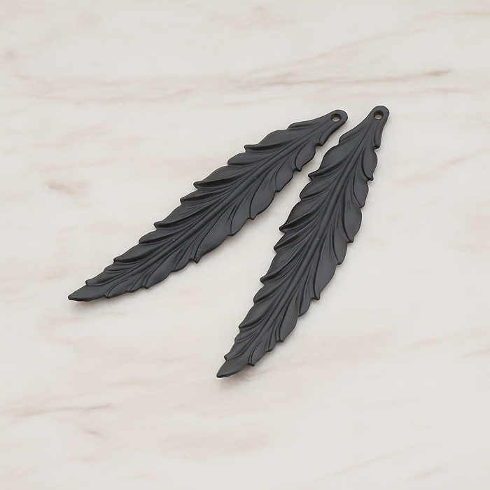 Thin Long Leaf Pendant, 2 Pc on warm marble background (PD.575-02)