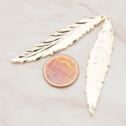 Thin Long Leaf Pendant, 2 Pc on warm marble background (PD.575-02)