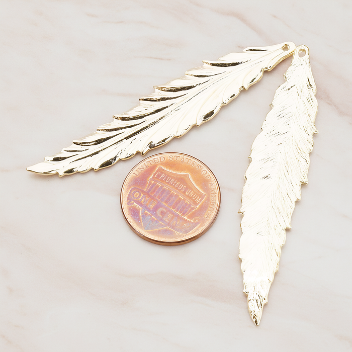 Thin Long Leaf Pendant, 2 Pc on warm marble background (PD.575-02)
