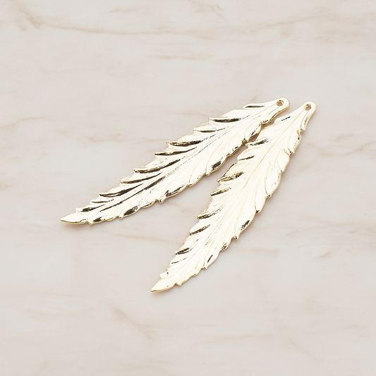 Thin Long Leaf Pendant, 2 Pc on warm marble background (PD.575-02)