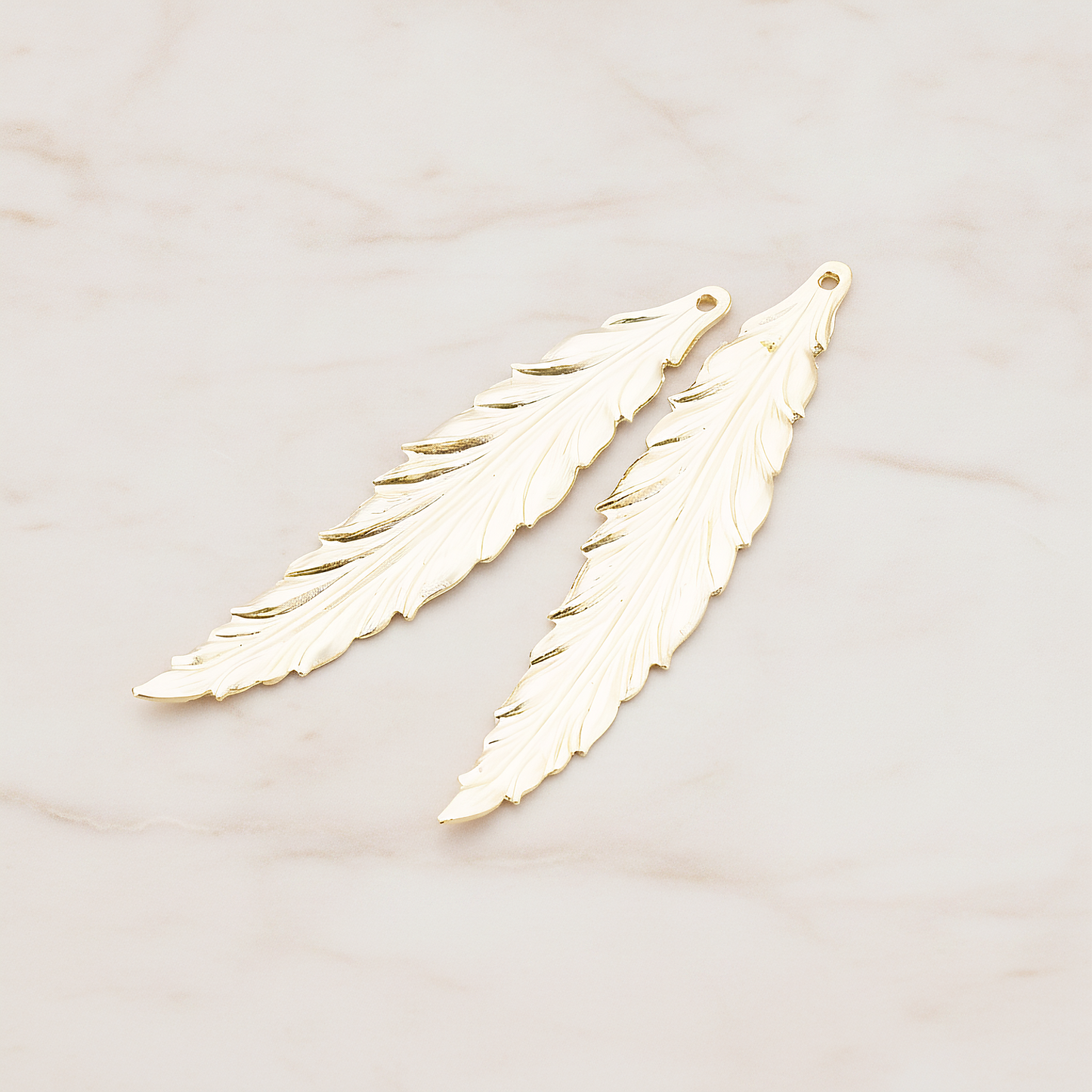 Thin Long Leaf Pendant, 2 Pc on warm marble background (PD.575-02)