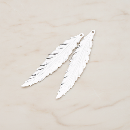 Thin Long Leaf Pendant, 2 Pc on warm marble background (PD.575-02)