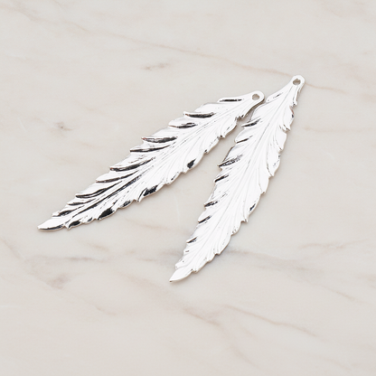 Thin Long Leaf Pendant, 2 Pc on warm marble background (PD.575-02)