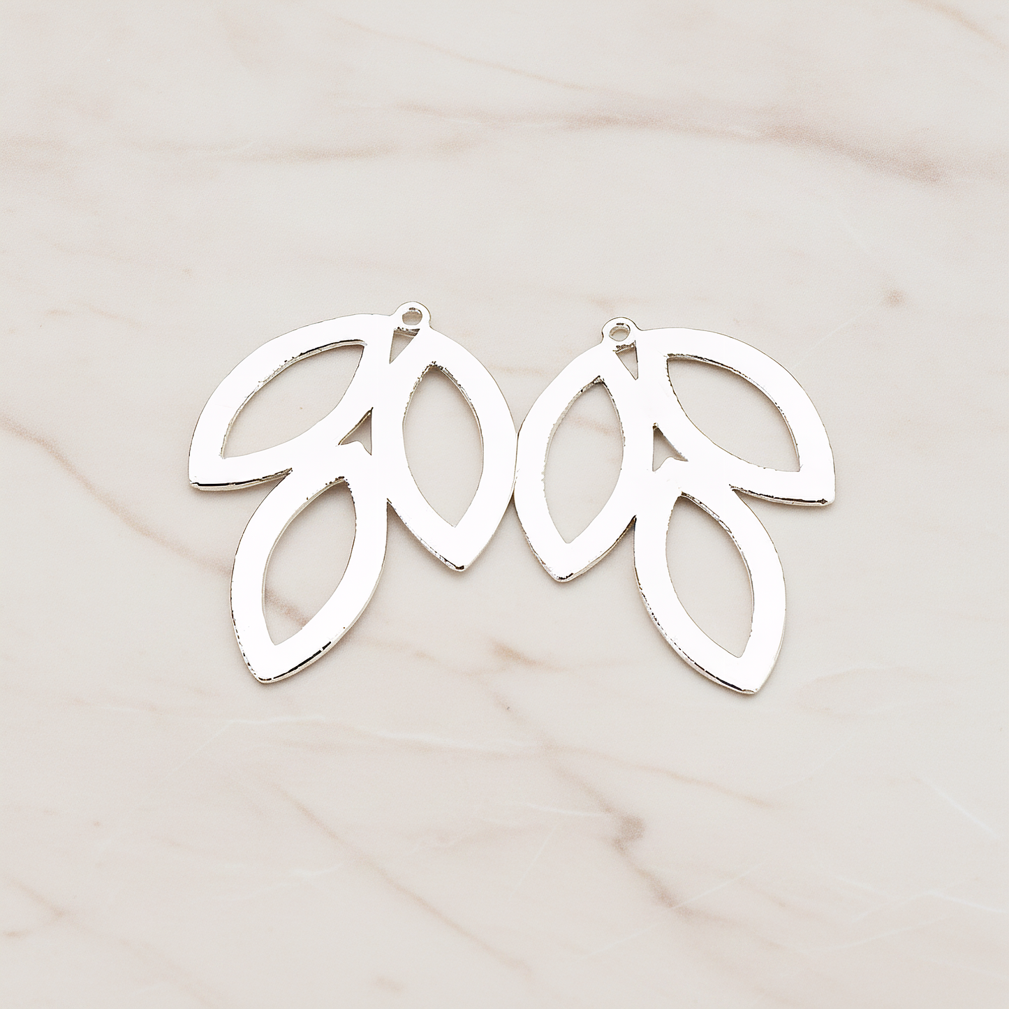 Triple Leaves Pendant, 2 Pc on warm marble background (PD.581)