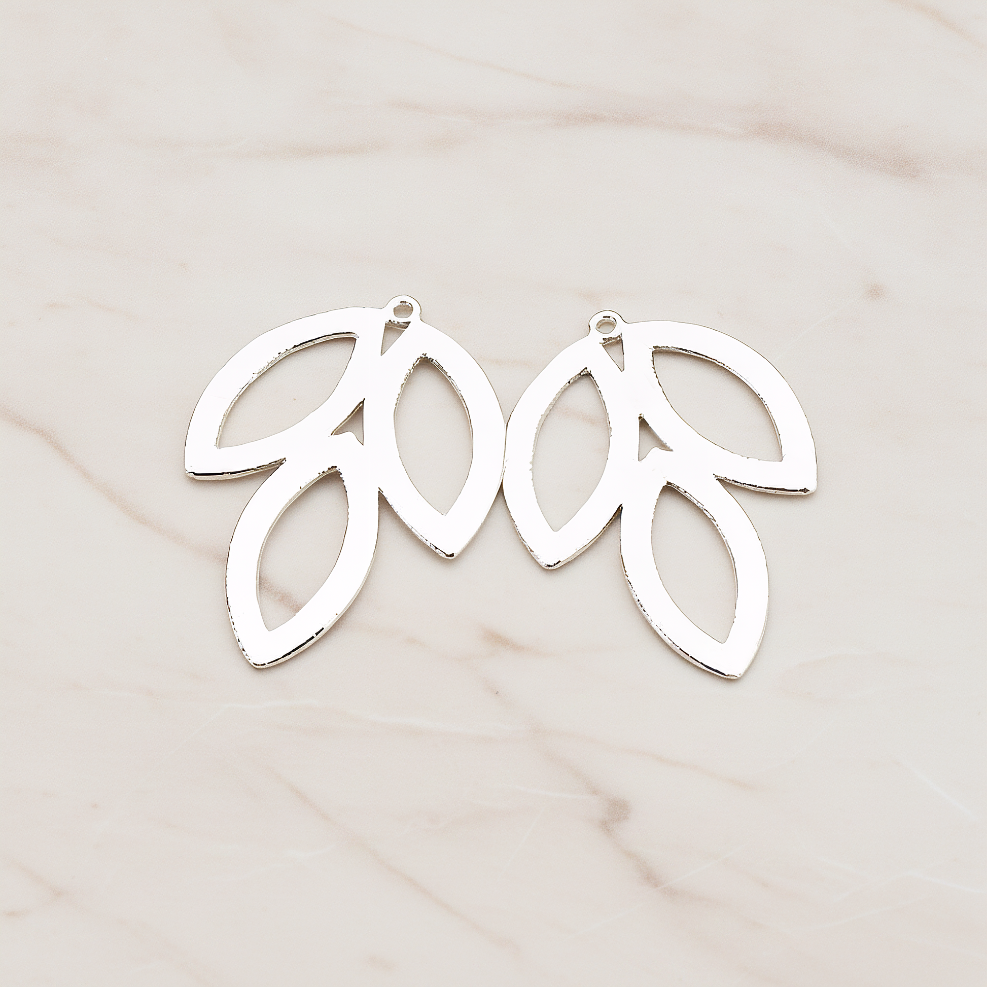 Triple Leaves Pendant, 2 Pc on warm marble background (PD.581)