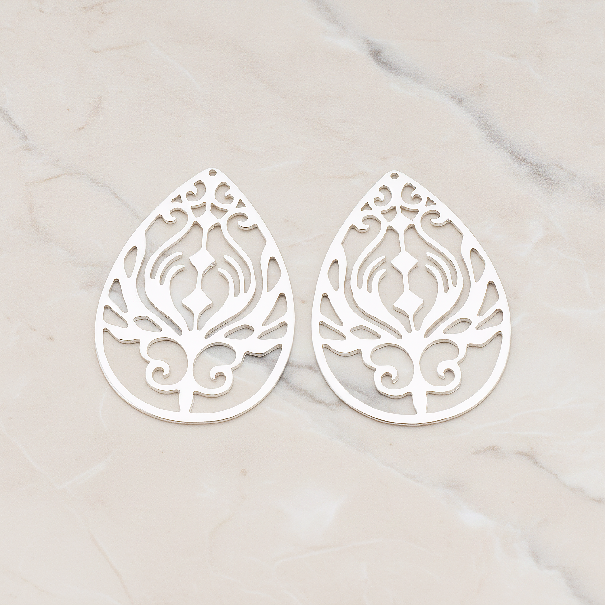 Peacock In Teardrop Pendant, 2 Pc on warm marble background (PD.585)