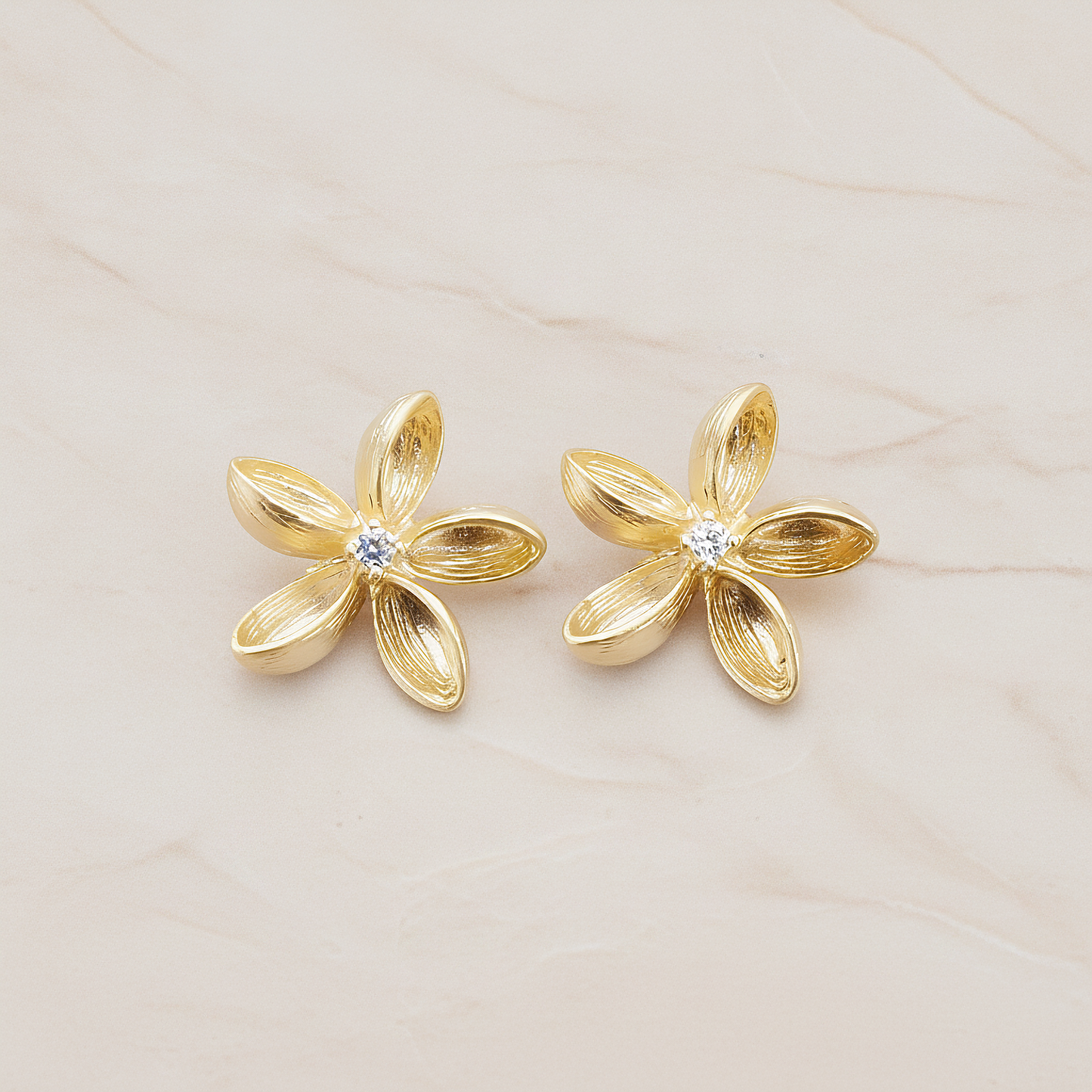 Clear Crystal Cubic Zirconia Centered Flower Pendant, 2 Pc on warm marble background (PD.592)