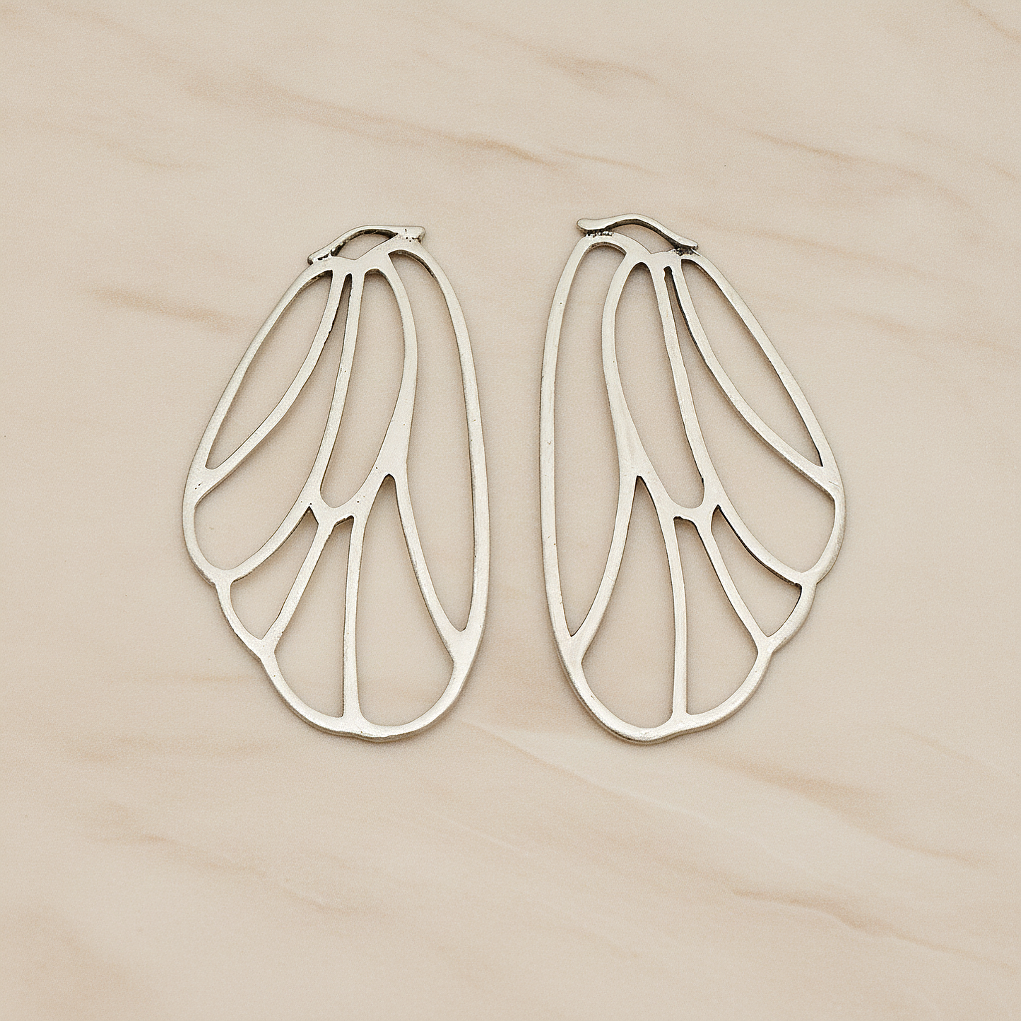 Angel Wing Pendant, 2 Pc on warm marble background (PD.595)