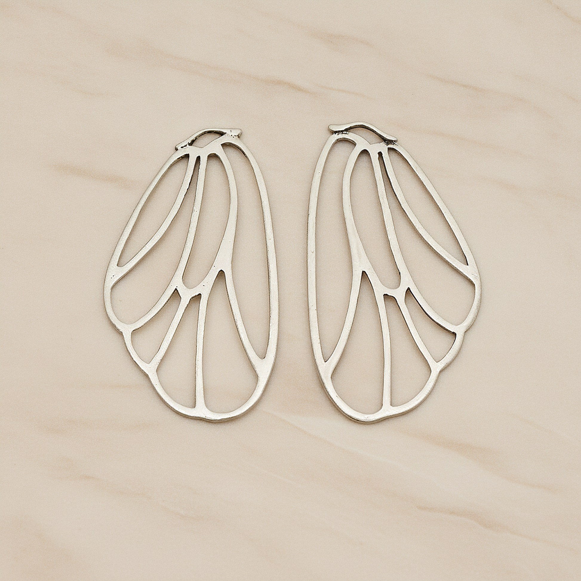 Angel Wing Pendant, 2 Pc on warm marble background (PD.595)