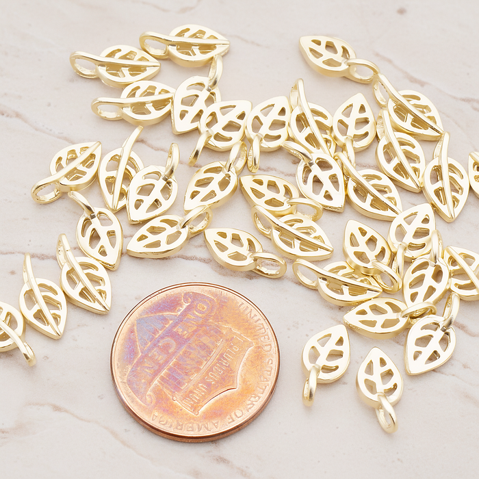 Mini Leaf Pendant, 4 Pc on warm marble background (PD.606)