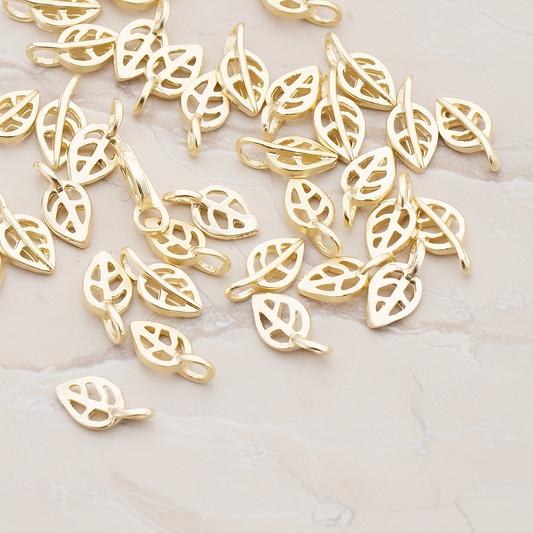 Mini Leaf Pendant, 4 Pc on warm marble background (PD.606)
