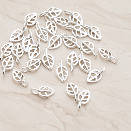 Mini Leaf Pendant, 4 Pc on warm marble background (PD.606)