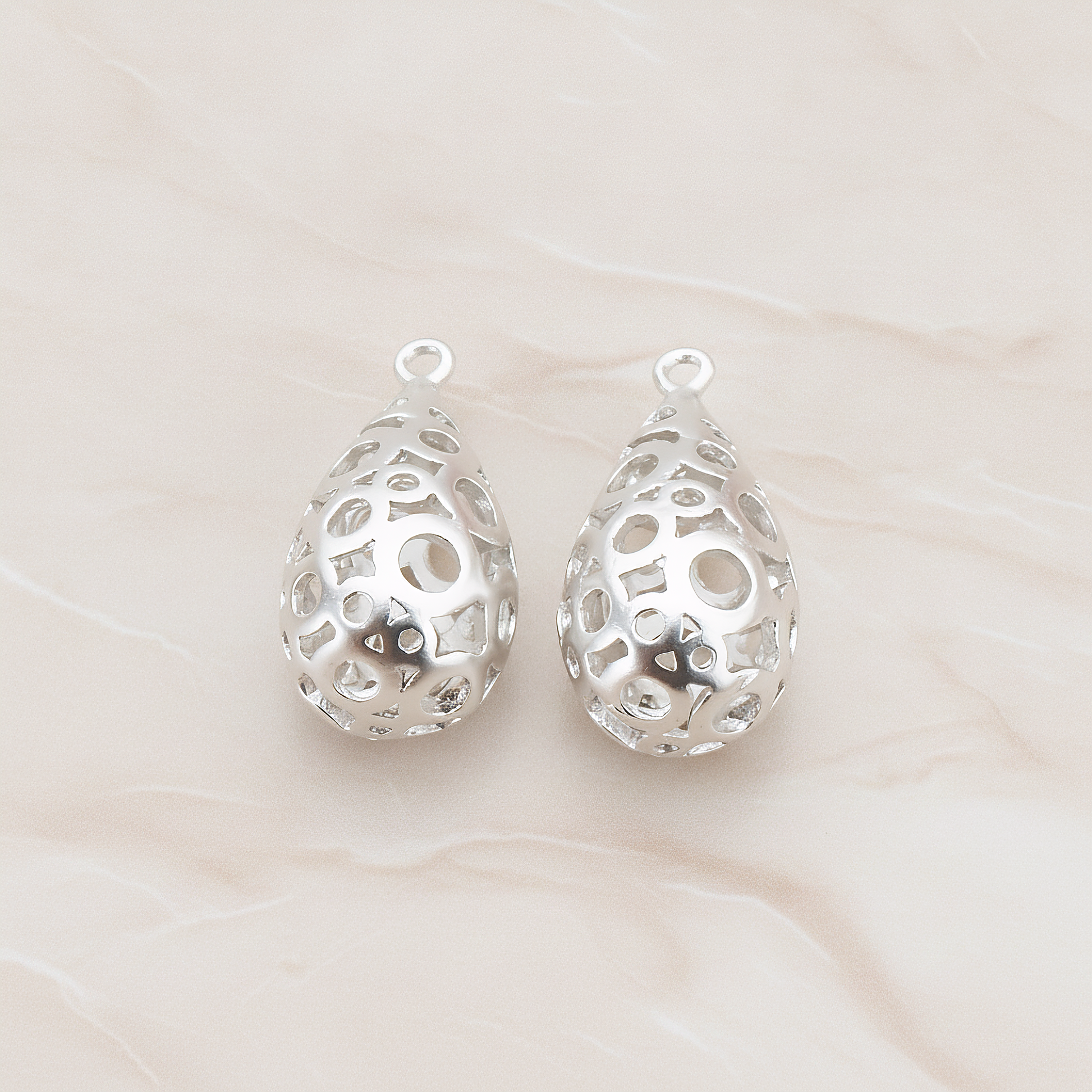 3D Textured Teardrop Charm Pendant, 2 Pc on warm marble background (PD.707)