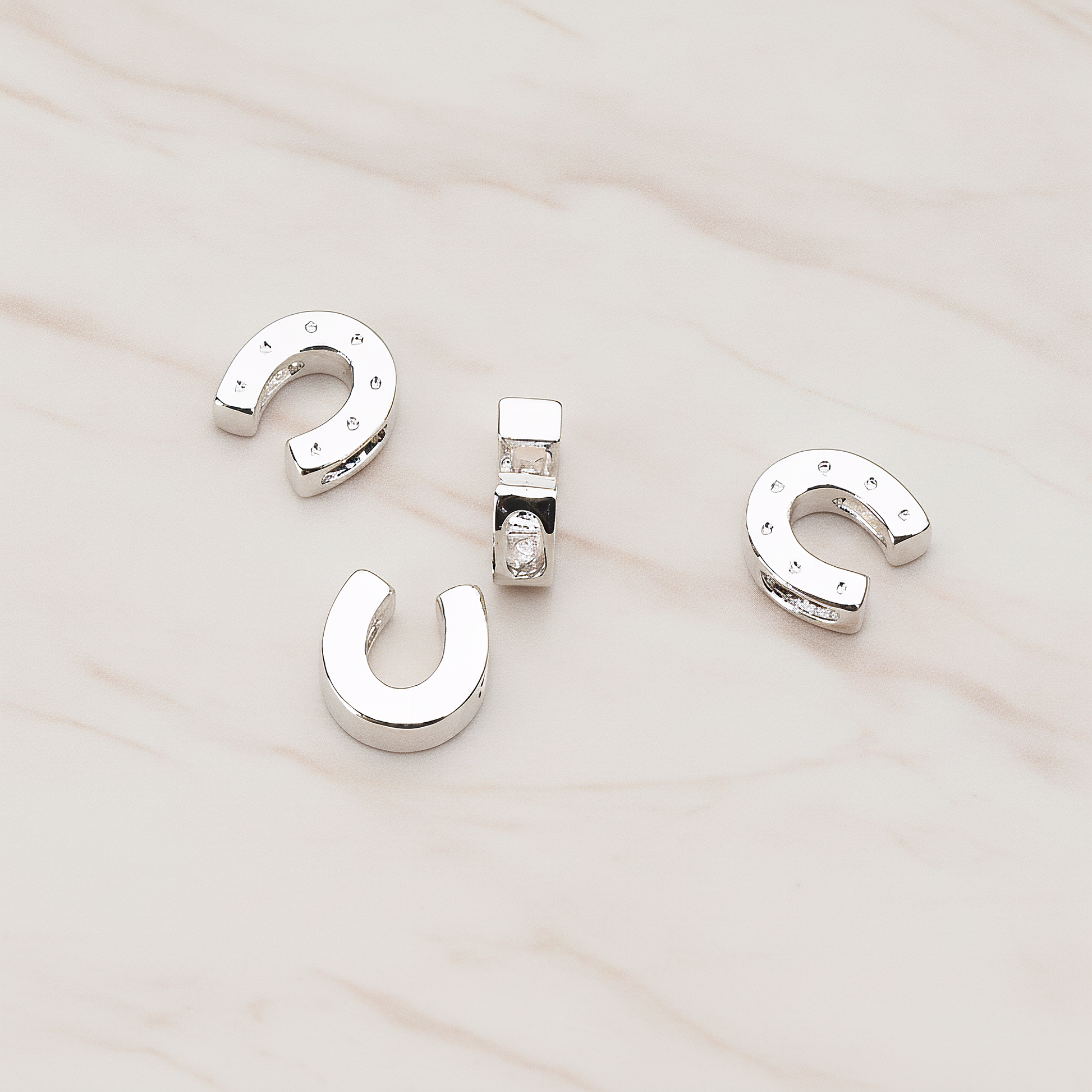 Horse Shoe Bead Pendant, 2 Pc on warm marble background (PD.746)