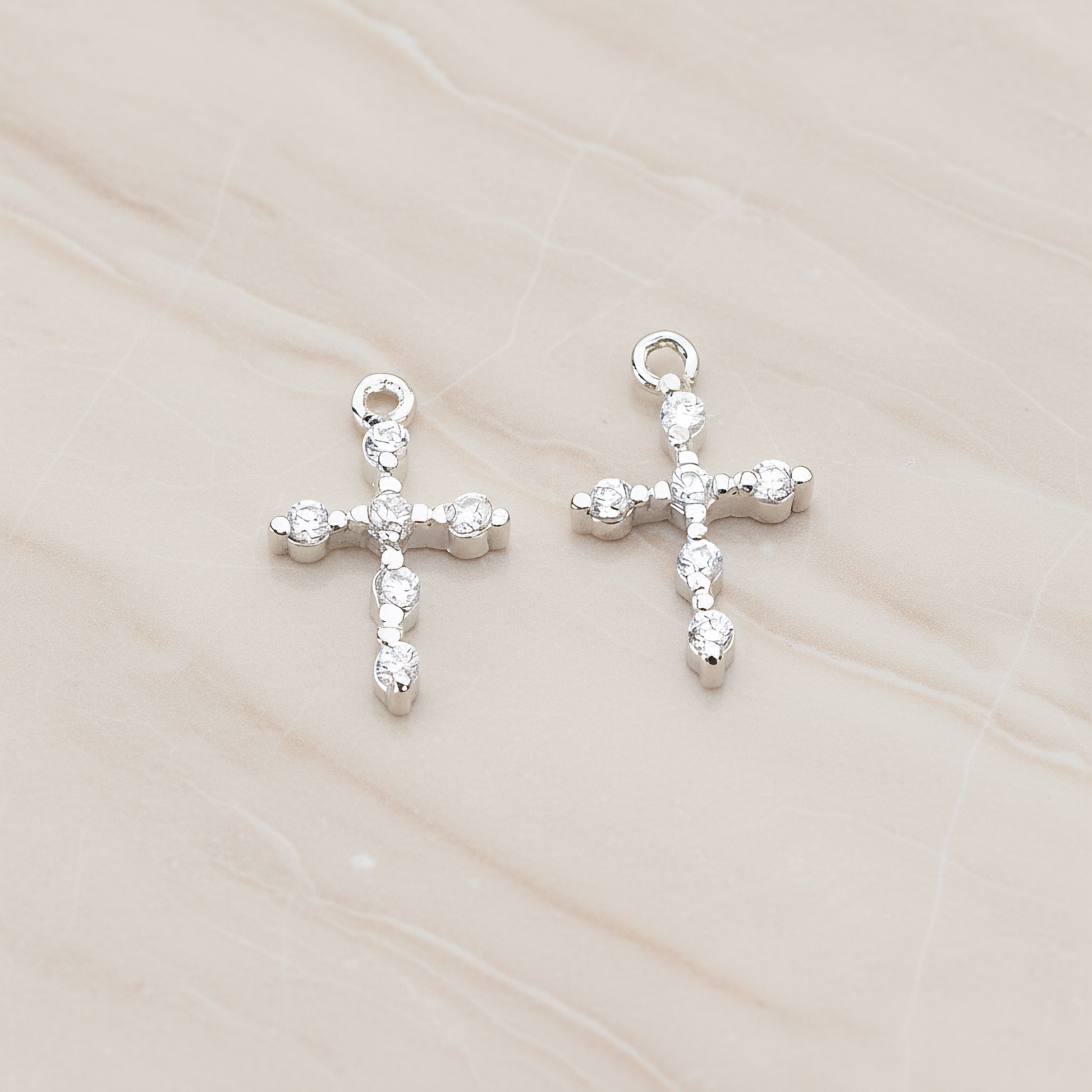 Clear Crystal Cubic Zirconia Setting Cross Pendant, 2 Pc on warm marble background (PD.751)