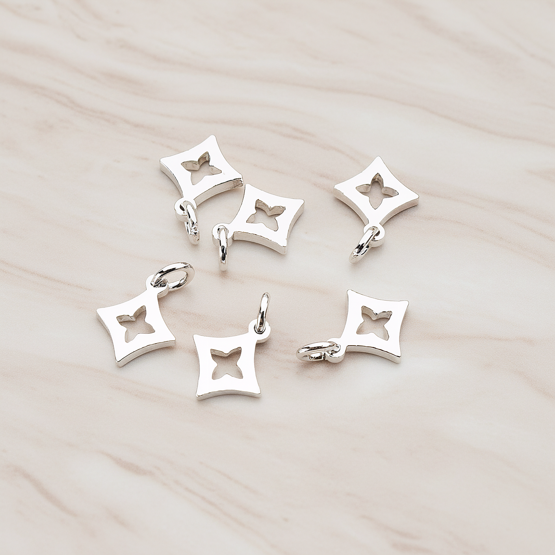 Poker Diamond Charm Pendant, 2 Pc on warm marble background (PD.753)