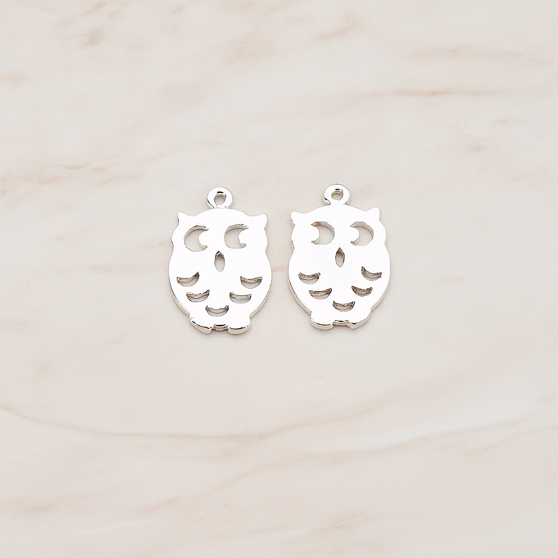 Mini Owl Pendant, 2 Pc on warm marble background (PD.773)